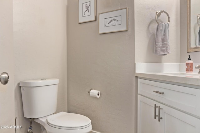 1777 W Redfield Rd, Gilbert, AZ 85233 - bathroom with a textured wall, toilet, and vanity