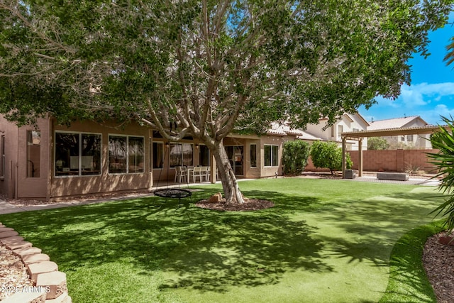 1777 W Redfield Rd, Gilbert, AZ 85233 - back of property with a fire pit, fence, a patio area, a yard, and stucco siding