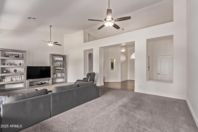 1777 W Redfield Rd, Gilbert, AZ 85233 - living room with vaulted ceiling, baseboards, carpet, and ceiling fan