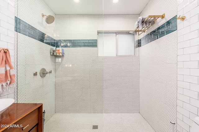 bathroom with a tile shower