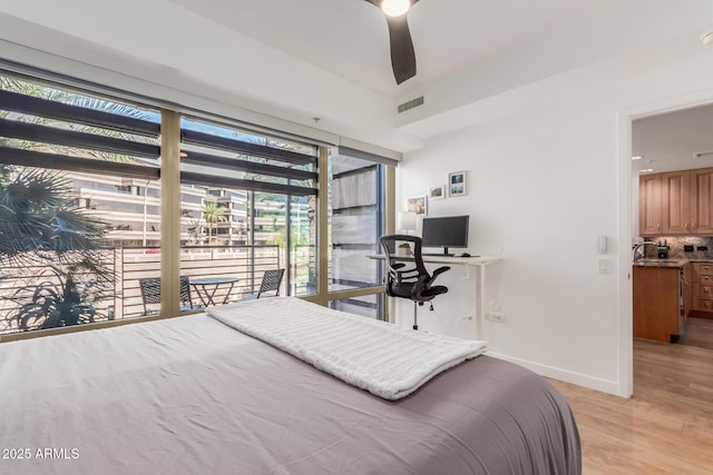 bedroom featuring light wood finished floors, visible vents, ceiling fan, access to outside, and baseboards