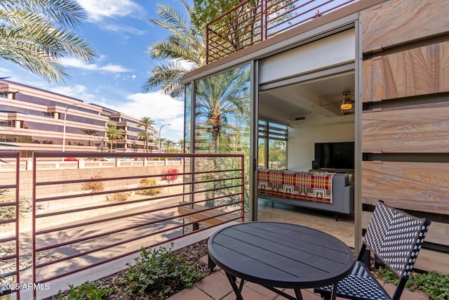 view of patio with a balcony