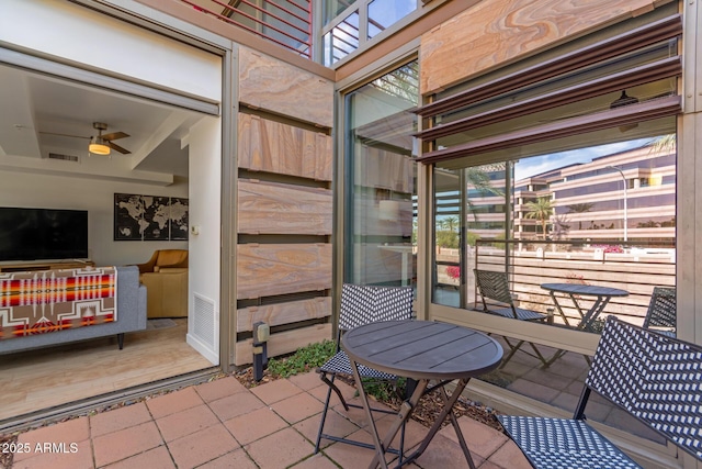 view of patio / terrace featuring visible vents