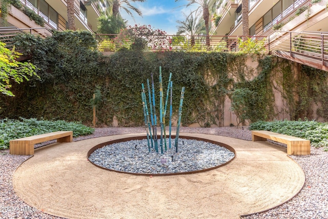 view of home's community with a patio