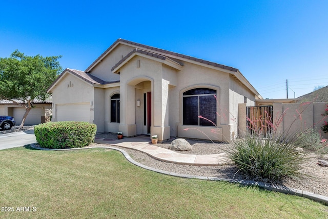 6742 W El Cortez Pl, Peoria, AZ 85383 - view of front facade with an attached garage, stucco siding, and a tiled roof