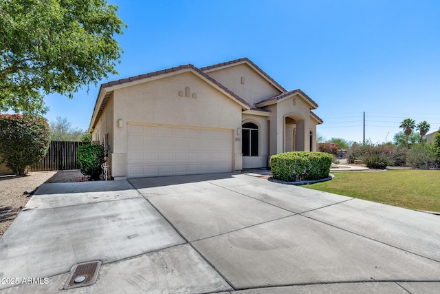 6742 W El Cortez Pl, Peoria, AZ 85383 - mediterranean / spanish-style house featuring stucco siding, a garage, driveway, and a tiled roof