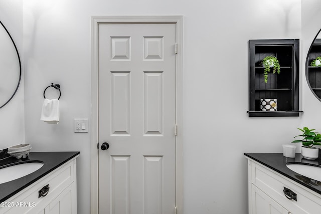 6742 W El Cortez Pl, Peoria, AZ 85383 - bathroom featuring two vanities