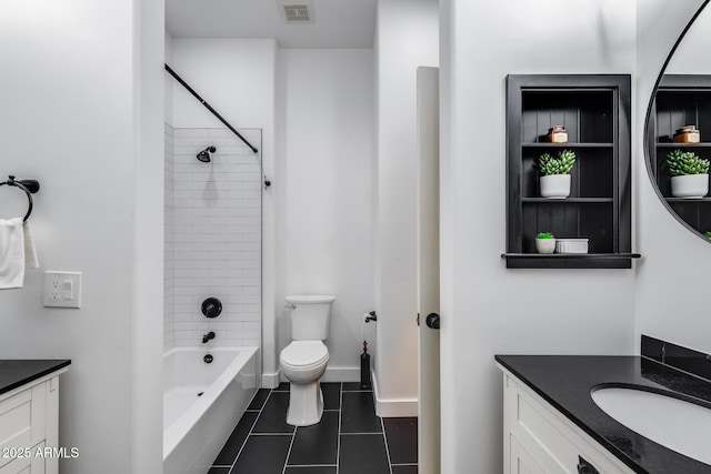 6742 W El Cortez Pl, Peoria, AZ 85383 - bathroom with vanity, toilet, tile patterned flooring, bathing tub / shower combination, and baseboards