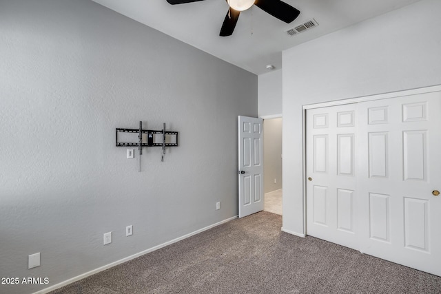 6742 W El Cortez Pl, Peoria, AZ 85383 - unfurnished bedroom featuring carpet, a closet, baseboards, and a ceiling fan