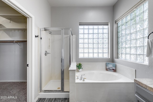6742 W El Cortez Pl, Peoria, AZ 85383 - full bathroom with a shower stall, a bath, and plenty of natural light