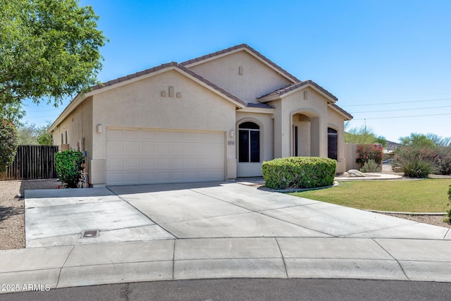 6742 W El Cortez Pl, Peoria, AZ 85383 - mediterranean / spanish-style home with stucco siding, a garage, concrete driveway, and a tile roof