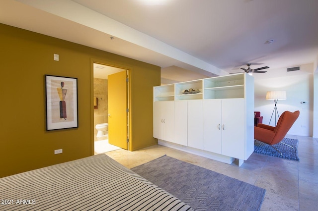 bedroom featuring ceiling fan and ensuite bathroom