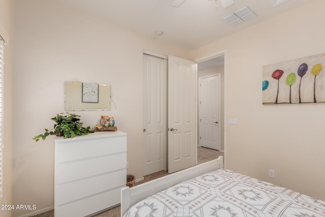 carpeted bedroom featuring ceiling fan