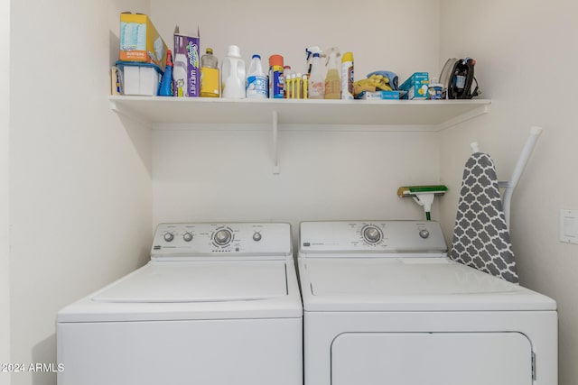 laundry room featuring washing machine and dryer