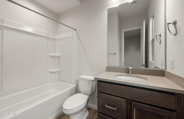 full bathroom with toilet, vanity, and bathing tub / shower combination