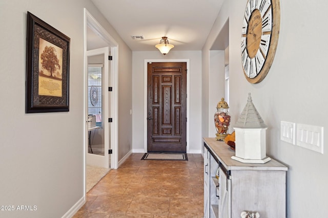 entryway featuring visible vents and baseboards