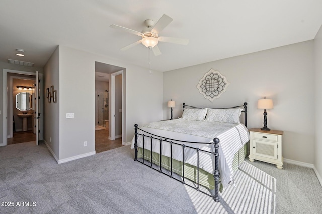 carpeted bedroom featuring visible vents, baseboards, and ceiling fan