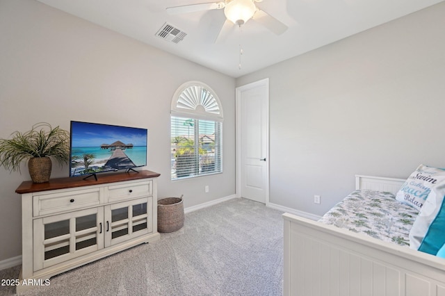 bedroom with carpet flooring, baseboards, visible vents, and ceiling fan