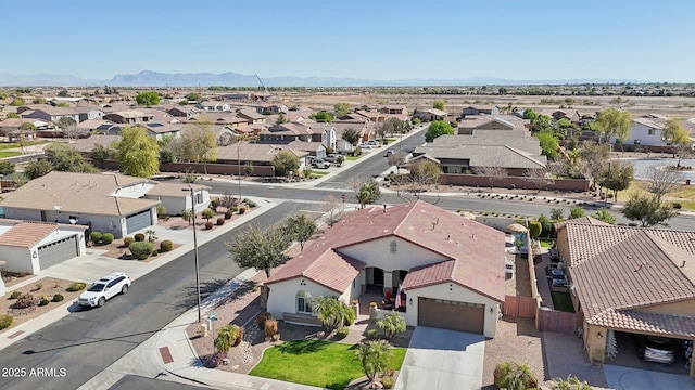 birds eye view of property featuring a residential view and a mountain view