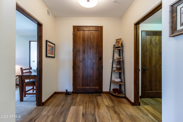 entrance foyer with dark wood-type flooring