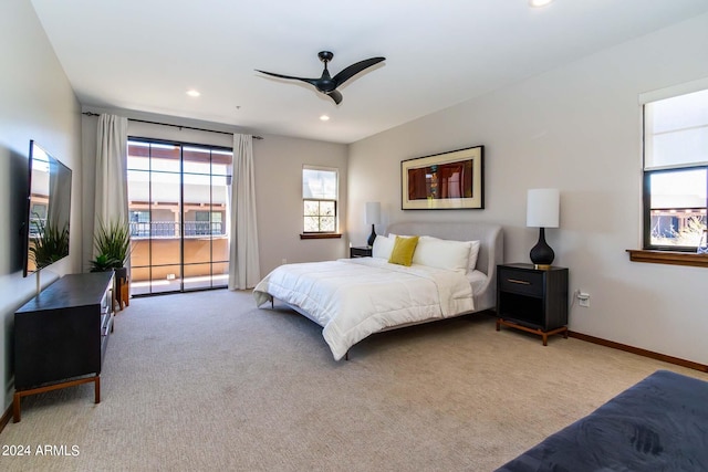 bedroom with light colored carpet and ceiling fan