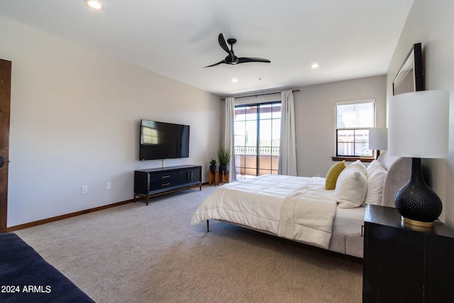 bedroom with light carpet and ceiling fan