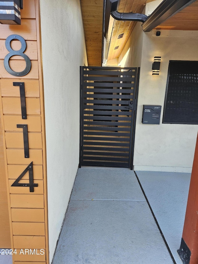 property entrance featuring stucco siding