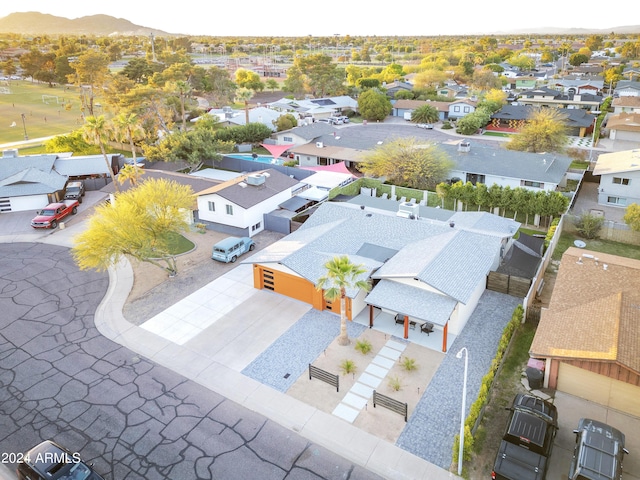 drone / aerial view featuring a mountain view and a residential view