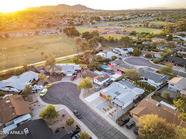 drone / aerial view featuring a residential view and a mountain view