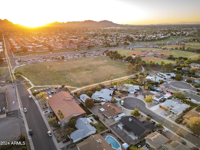aerial view at dusk with a residential view and a mountain view