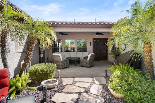 view of patio featuring outdoor lounge area and ceiling fan