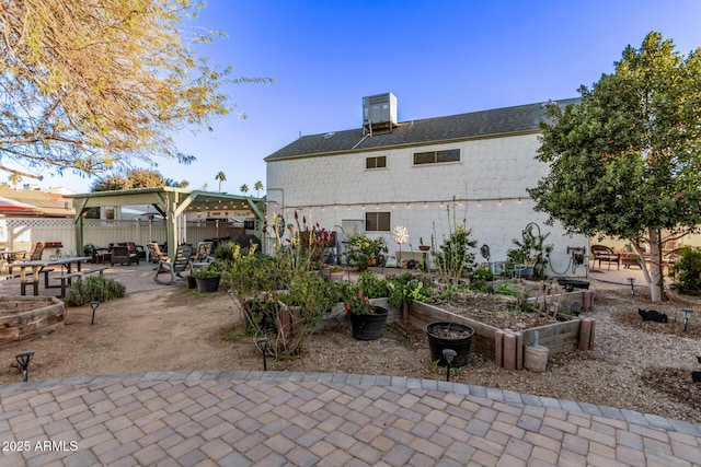 rear view of property with a patio area