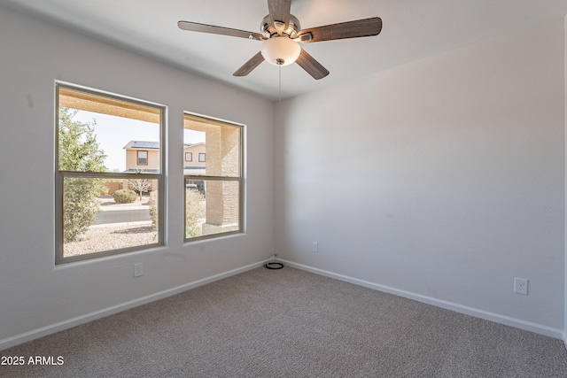 359 E Watson Pl, Casa Grande, AZ 85122 - unfurnished room with carpet floors, baseboards, and ceiling fan