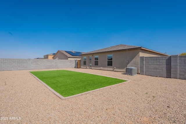 359 E Watson Pl, Casa Grande, AZ 85122 - rear view of house featuring central AC and stucco siding