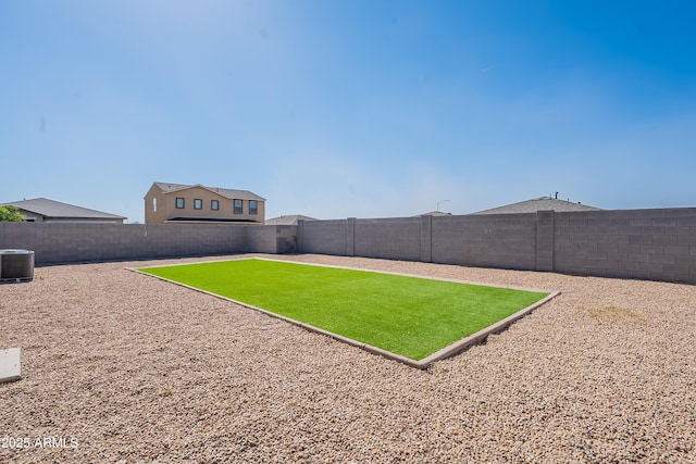 359 E Watson Pl, Casa Grande, AZ 85122 - view of yard featuring central air condition unit