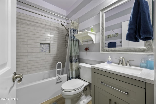 bathroom featuring vanity, shower / tub combo with curtain, and toilet
