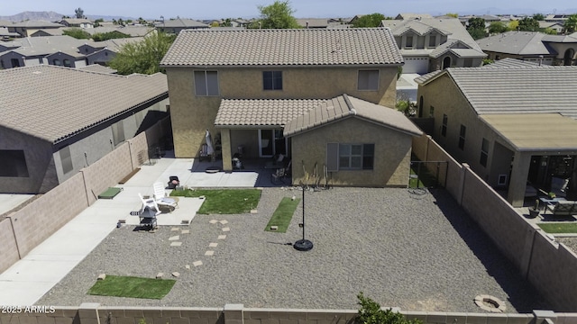birds eye view of property with a residential view