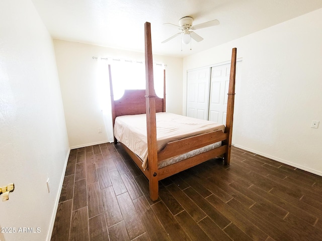 bedroom featuring a closet, ceiling fan, and dark hardwood / wood-style floors