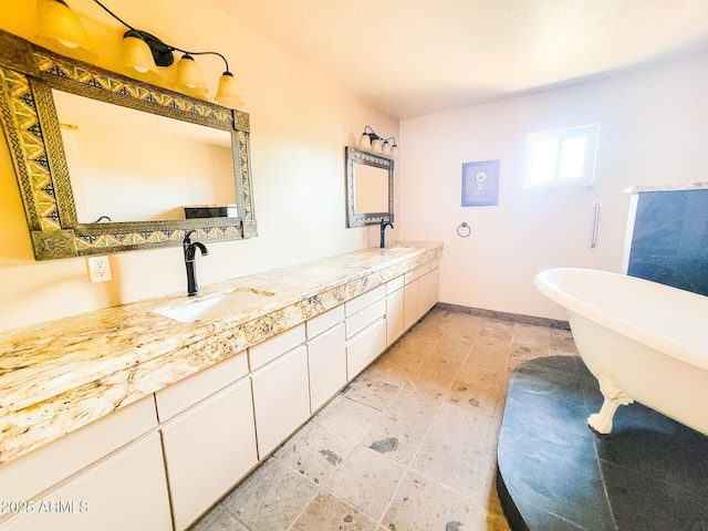 bathroom featuring vanity and a bathtub