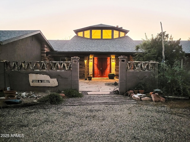 view of front of property with a patio