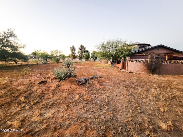 view of yard with a rural view