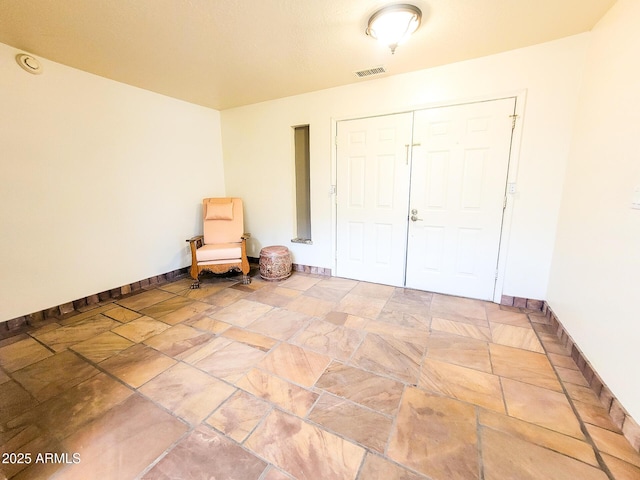 unfurnished bedroom with a closet