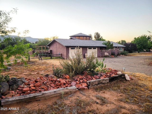 view of front of home with a mountain view