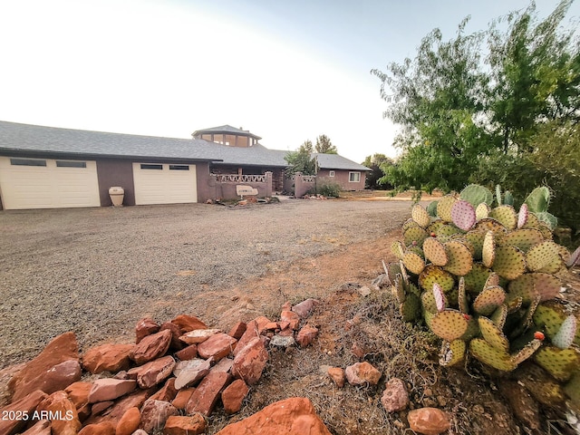 view of yard featuring a garage