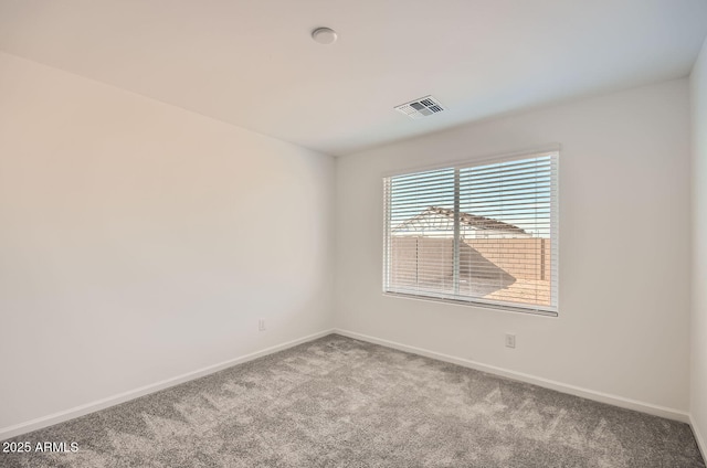 12086 E Sunflower Ln, Florence, AZ 85132 - carpeted spare room with baseboards and visible vents