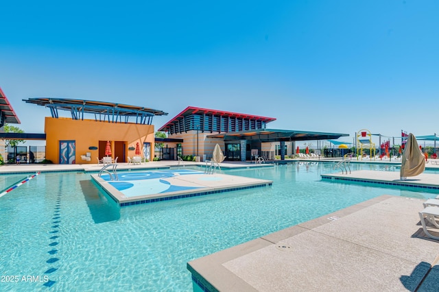 12086 E Sunflower Ln, Florence, AZ 85132 - community pool featuring a patio