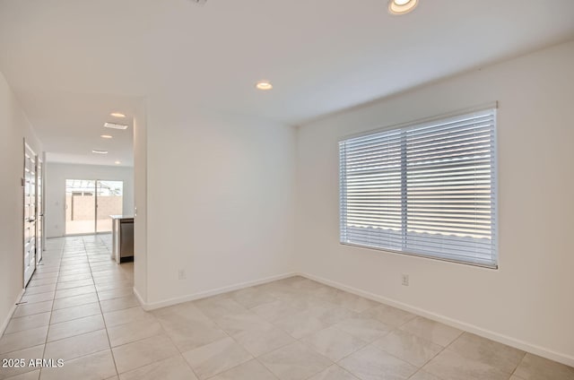 12086 E Sunflower Ln, Florence, AZ 85132 - spare room with light tile patterned floors, visible vents, baseboards, and recessed lighting