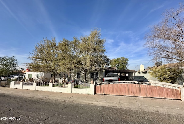 view of front facade with a carport