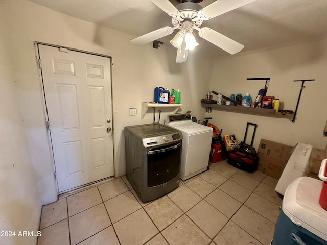 clothes washing area with ceiling fan, light tile patterned flooring, and independent washer and dryer