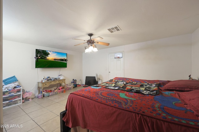 bedroom featuring light tile patterned floors and ceiling fan